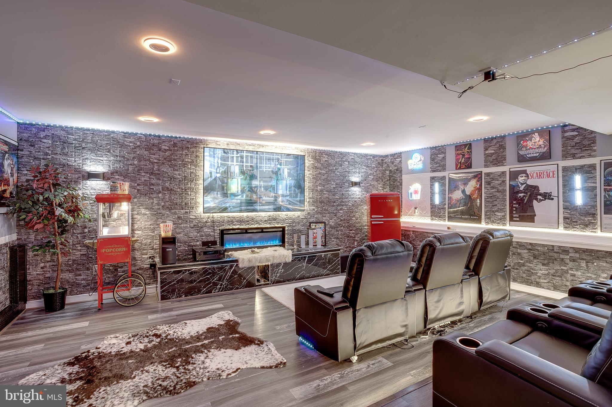 65 Morris Drive Sicklerville, NJ 08081 - Photo 19 of 28 a living room with furniture and a fireplace