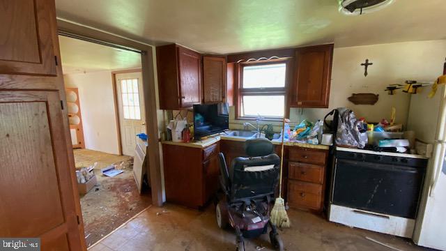201 Hoover Road Robertsdale, PA 16674 - Photo 10 of 55 a room with furniture a flat screen tv and a window