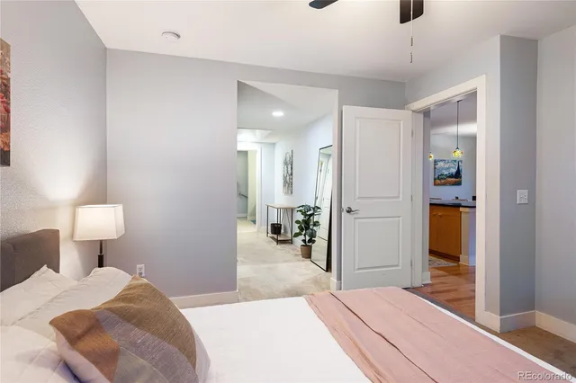 a bedroom with a bed and a view of bathroom