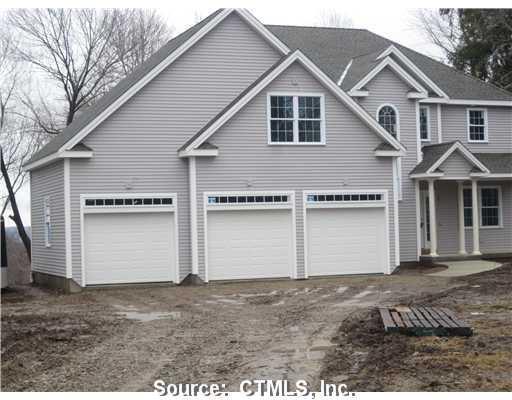 146 Penfield Hill Road Portland, CT 06480 - Photo 1 of 1 a front view of a house with a yard and garage