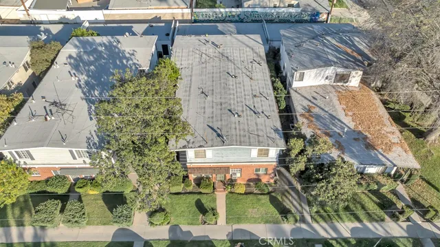 an aerial view of residential house and outdoor space