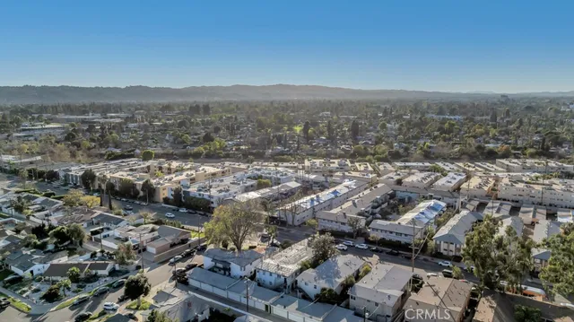 an aerial view of residential building and green space