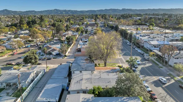 a view of balcony with wooden floor