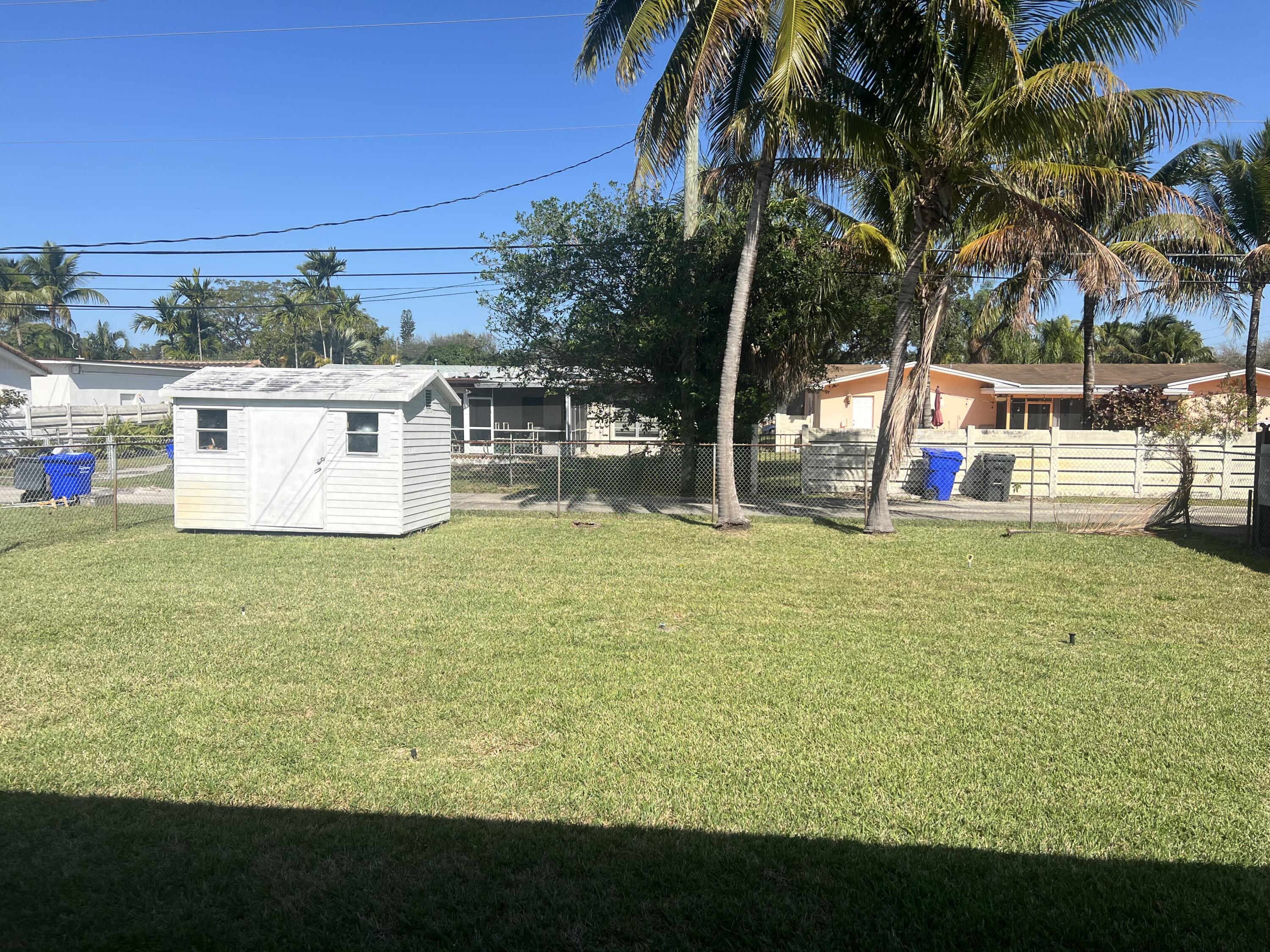 4007 Johnson Street Hollywood, FL 33021 - Photo 13 of 14 a view of a swimming pool with a patio