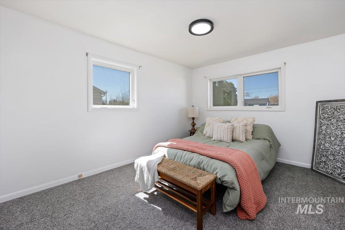 1214 H Street Rupert, ID 83350 - Photo 22 of 35 Carpeted bedroom featuring baseboards