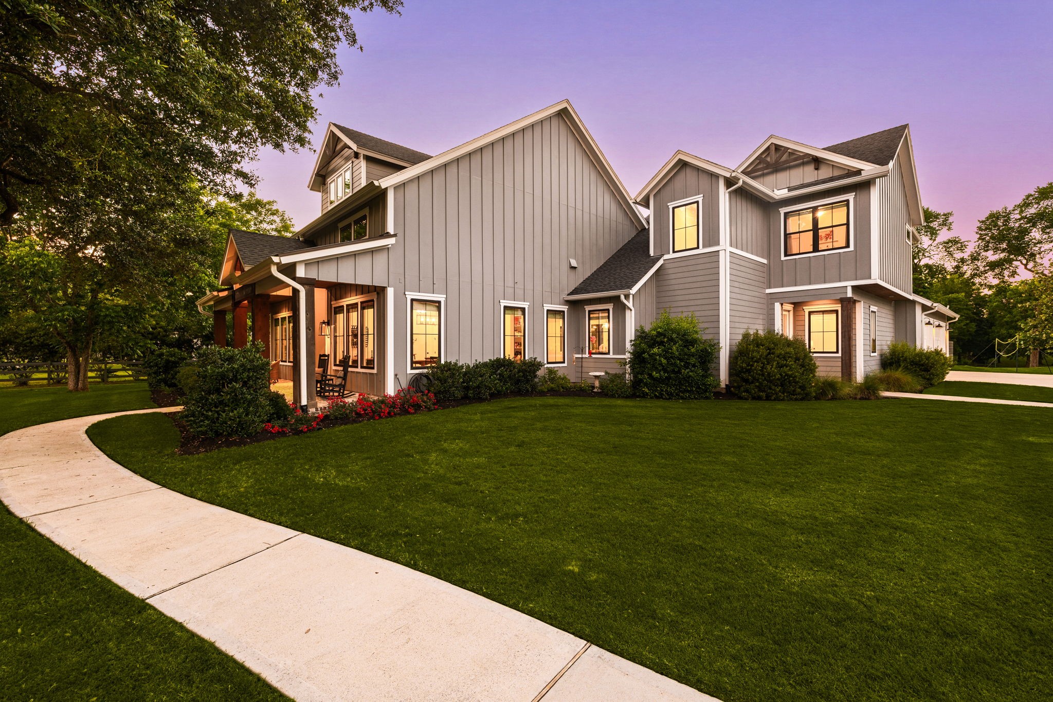 4311 Upper Oxbow Trace Fulshear, TX 77441 - Photo 2 of 49 Beautiful modern farmhouse with a welcoming front porch.