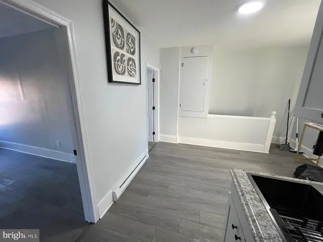 a bathroom with a bathtub and a sink