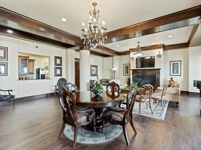 a view of a entryway with furniture and a chandelier