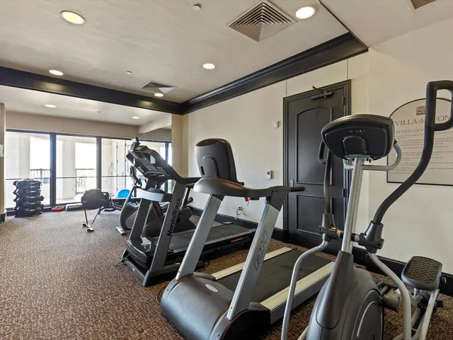 a view of a room with gym equipment
