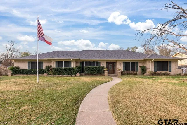 a front view of a house with a porch