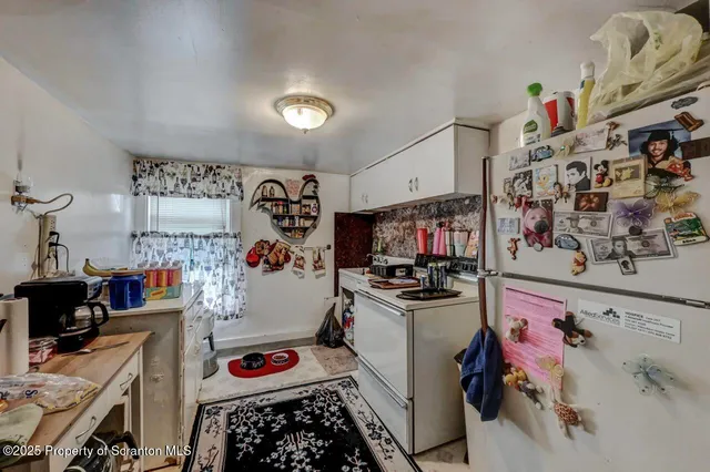 a view of a hallway with closet