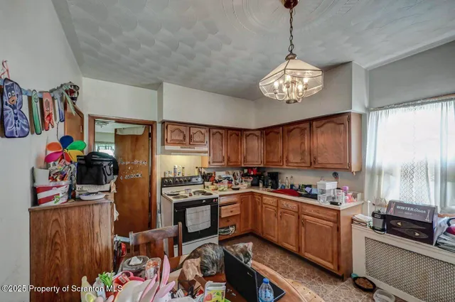 a bathroom with a sink mirror vanity and toilet