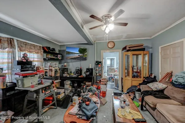 a bedroom with bed and a window