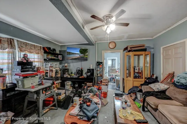 a bedroom with bed and a window