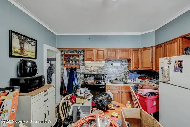 a view of a workspace with furniture and toys