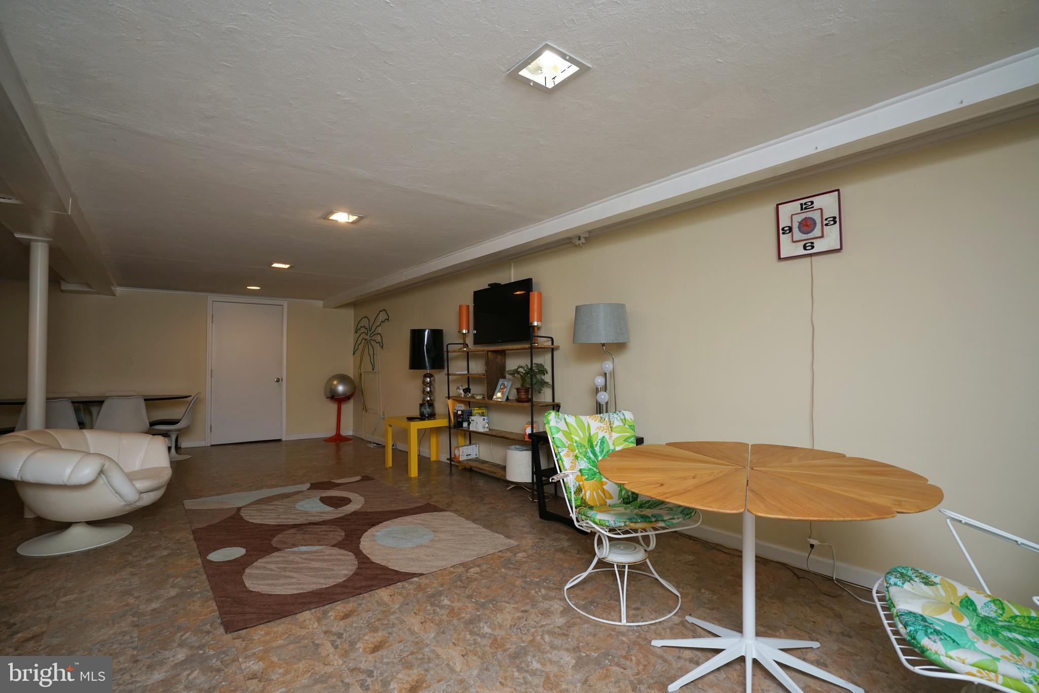 466 Store Road Harleysville, PA 19438 - Photo 22 of 23 a living room with furniture and a flat screen tv