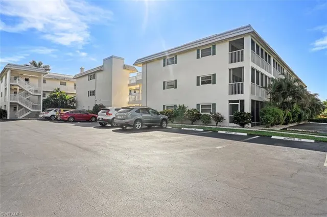 a view of a street with cars