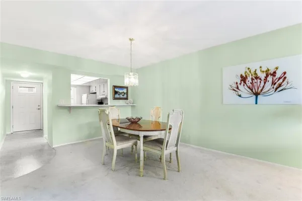 a view of a dining room with furniture