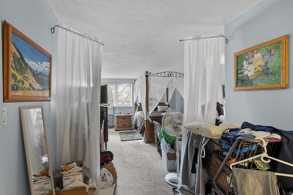 154 Lynnway, Unit 205 Lynn, MA 01902 - Photo 26 of 29 a view of a workspace with furniture and a window