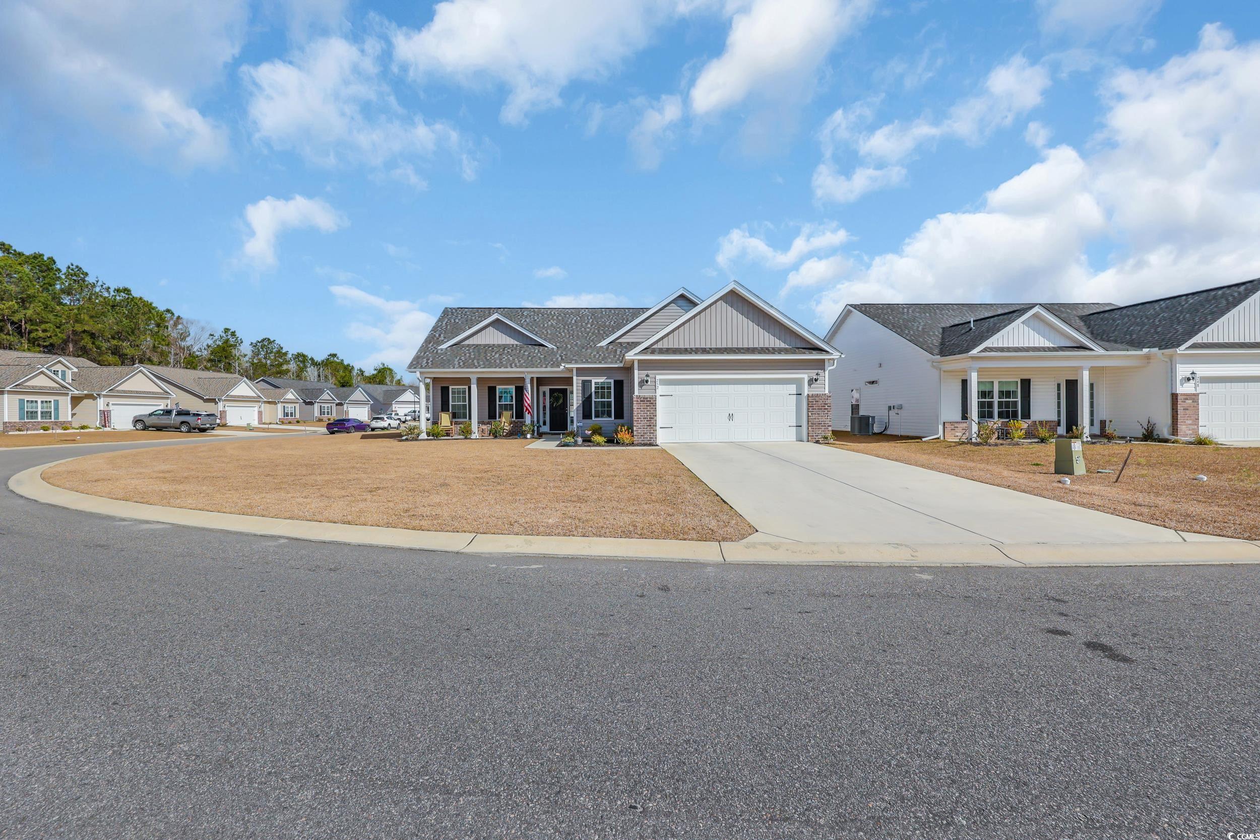 252 Lakota Loop Longs, SC 29568 - Photo 2 of 33 Craftsman inspired home featuring brick siding, dr