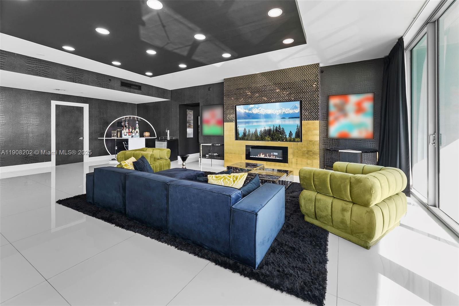 900 Biscayne Boulevard, Unit PH6201 Miami, FL 33132 - Photo 11 of 73 a living room with furniture and a flat screen tv