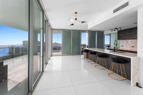 a room with furniture and flat screen tv