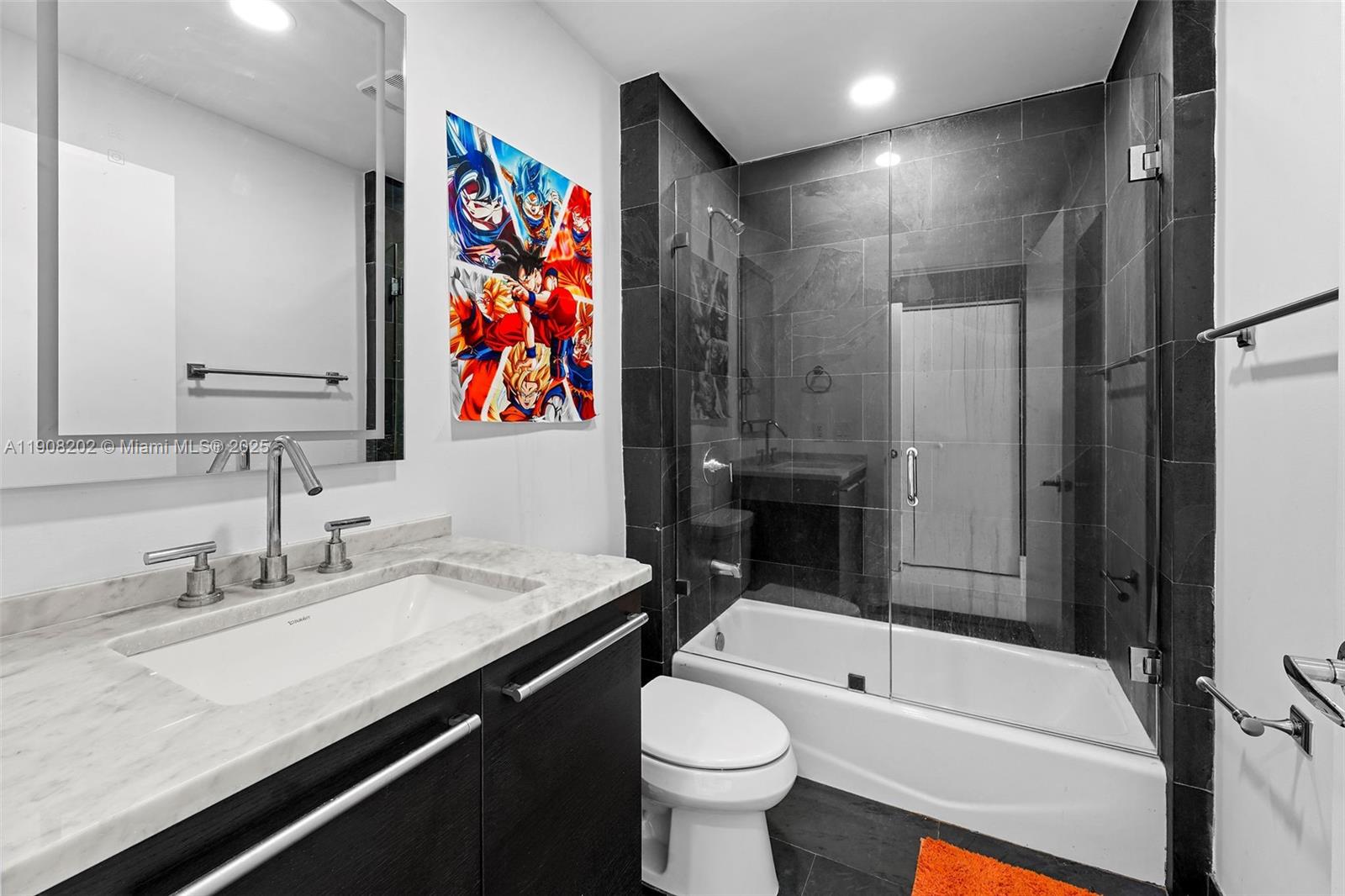 900 Biscayne Boulevard, Unit PH6201 Miami, FL 33132 - Photo 38 of 73 a bathroom with a sink a toilet and shower