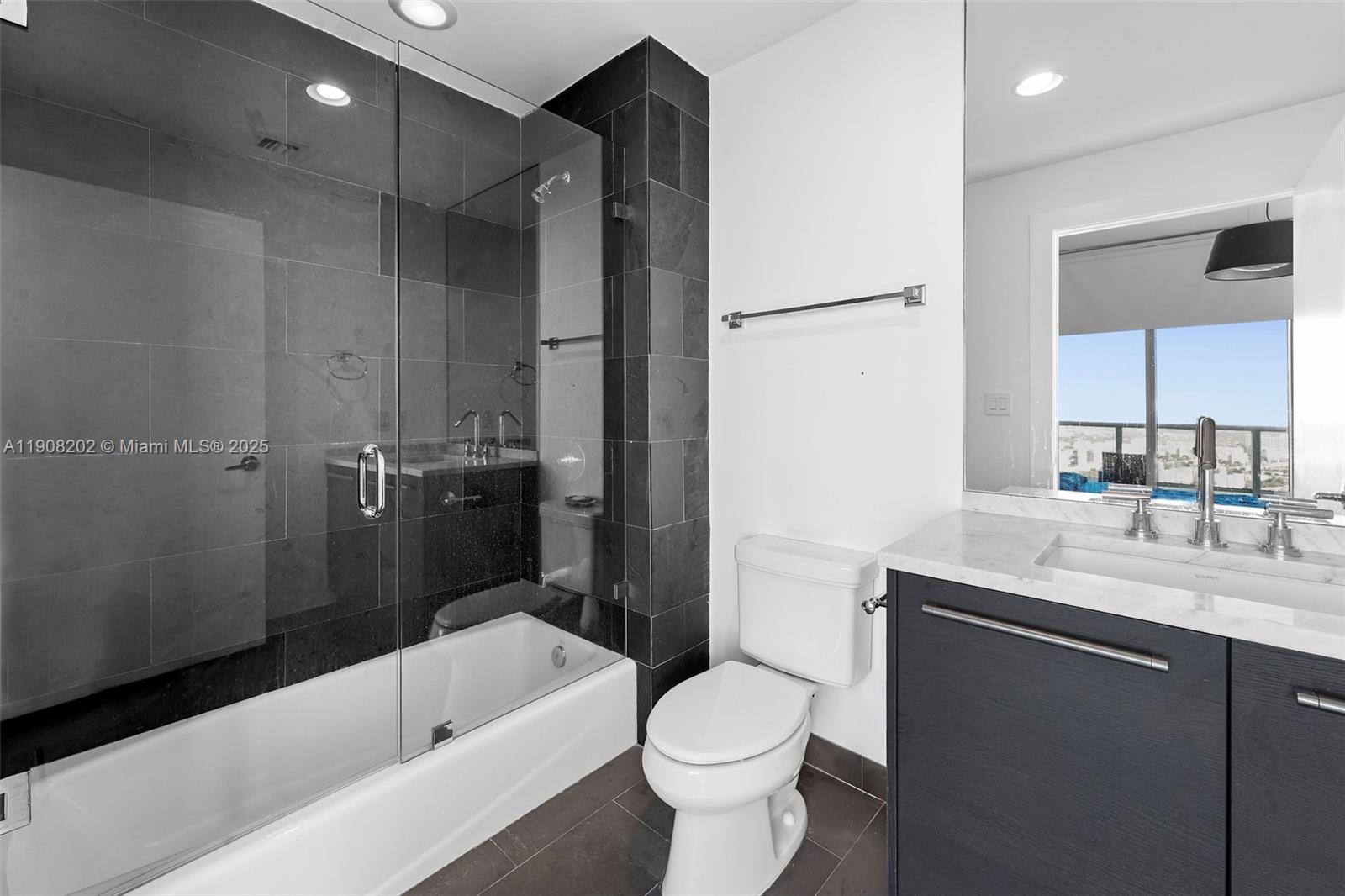 900 Biscayne Boulevard, Unit PH6201 Miami, FL 33132 - Photo 41 of 73 a bathroom with a sink toilet and shower
