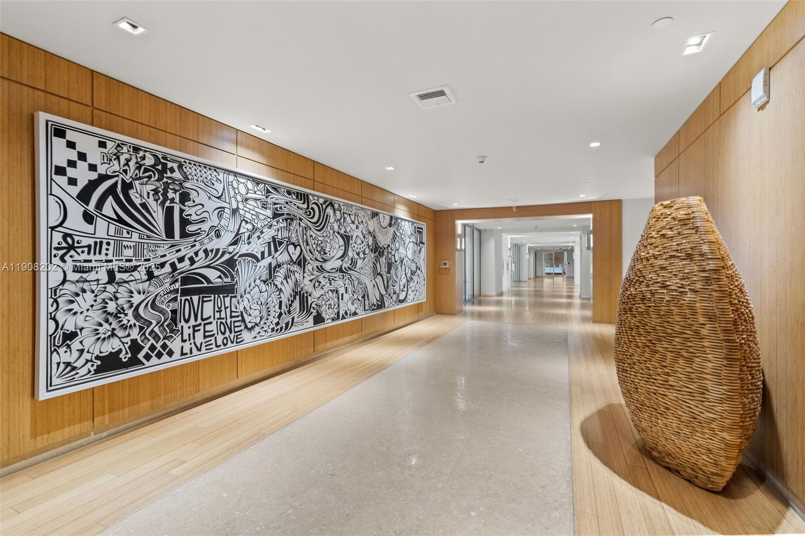 900 Biscayne Boulevard, Unit PH6201 Miami, FL 33132 - Photo 57 of 73 a view of a entryway door with a couch