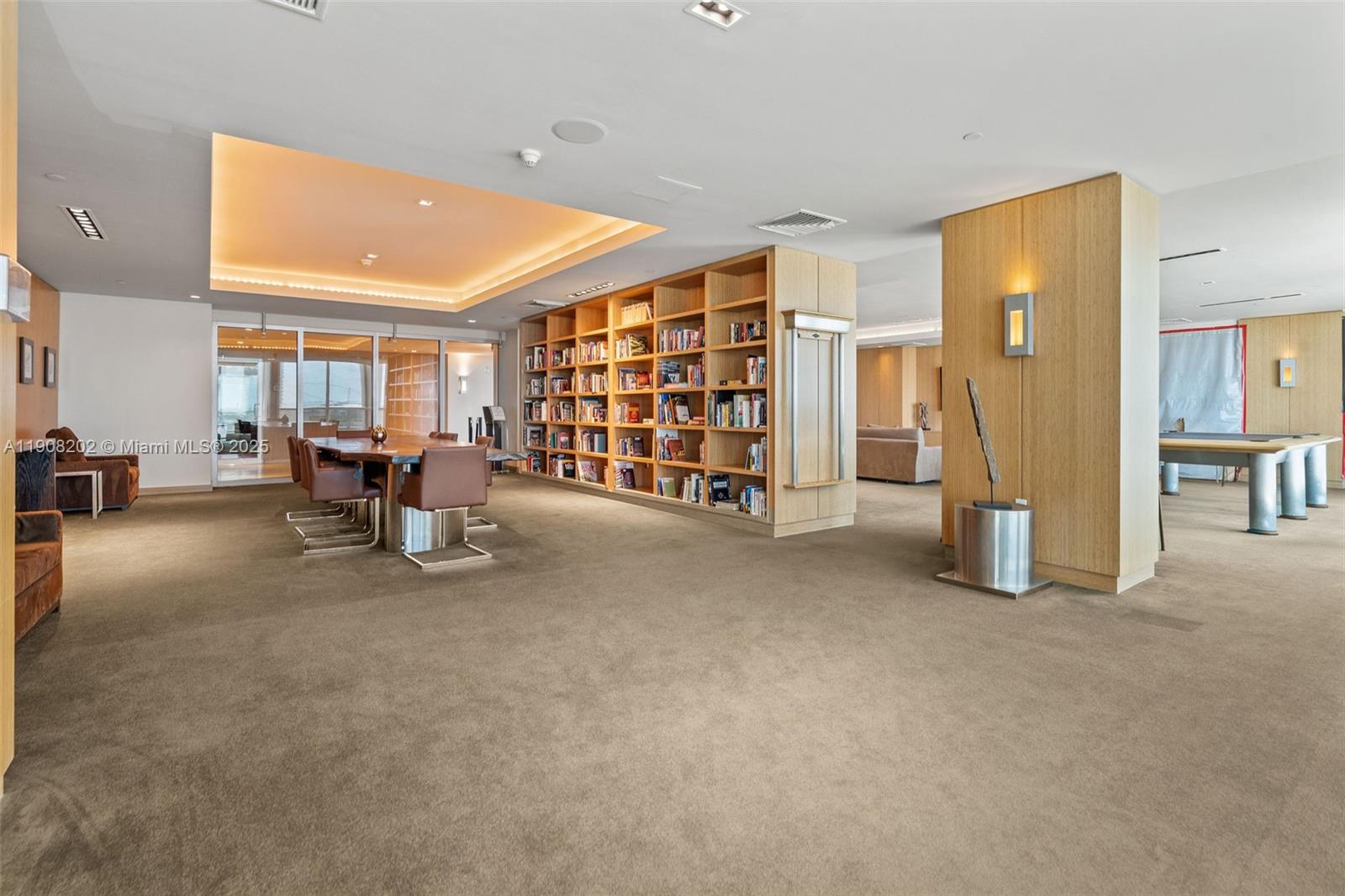 900 Biscayne Boulevard, Unit PH6201 Miami, FL 33132 - Photo 65 of 73 a view of a livingroom with furniture and a flat screen tv