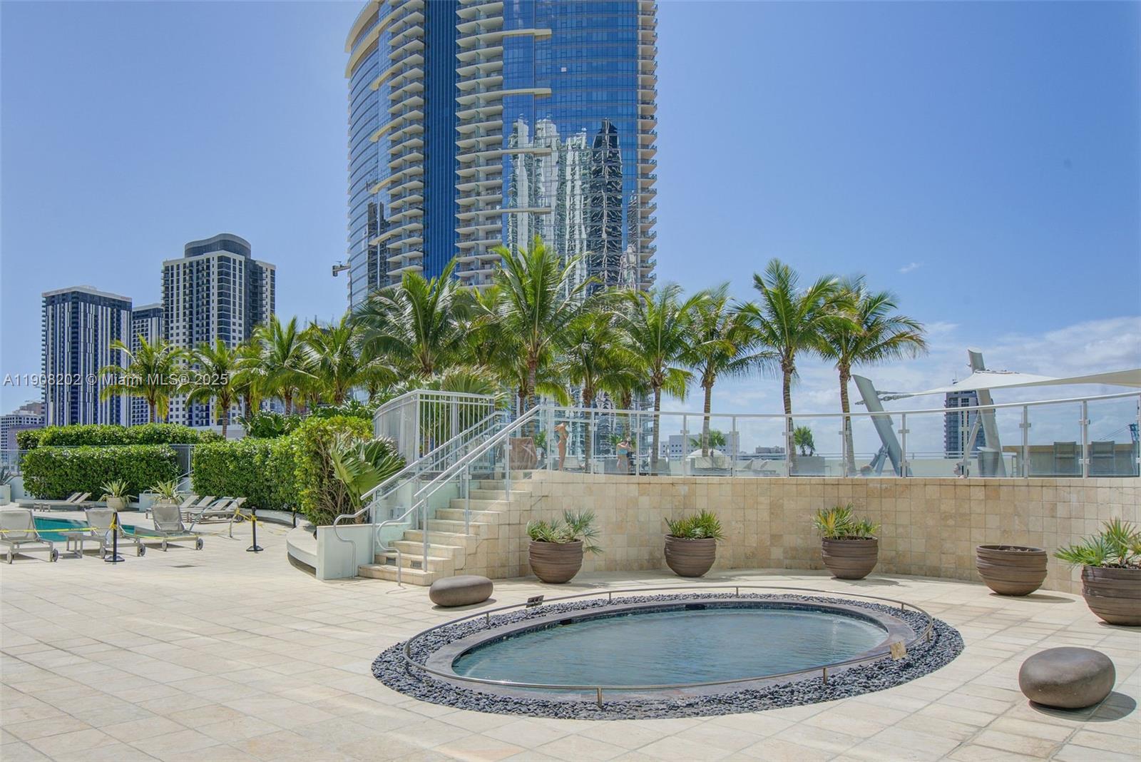 900 Biscayne Boulevard, Unit PH6201 Miami, FL 33132 - Photo 71 of 73 a bathroom with a potted plant and a sink