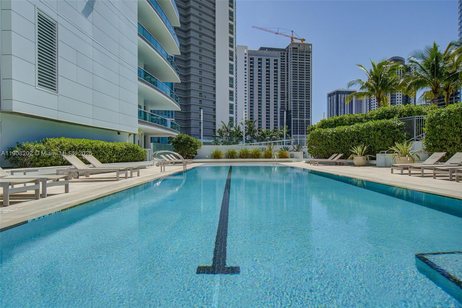 900 Biscayne Boulevard, Unit PH6201 Miami, FL 33132 - Photo 73 of 73 a swimming pool with outdoor seating and yard