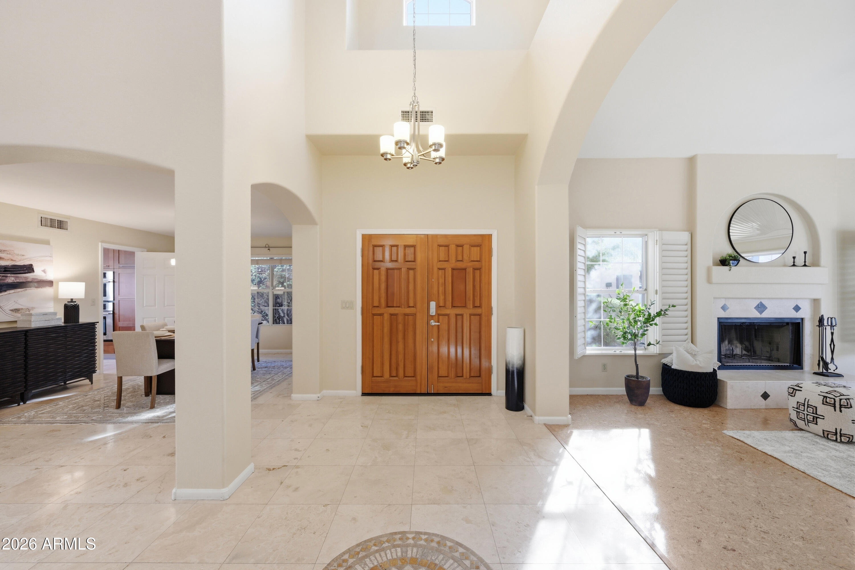 9502 East Presidio Road Scottsdale, AZ 85260 - Photo 10 of 39 a view of a livingroom with furniture window and wooden floor