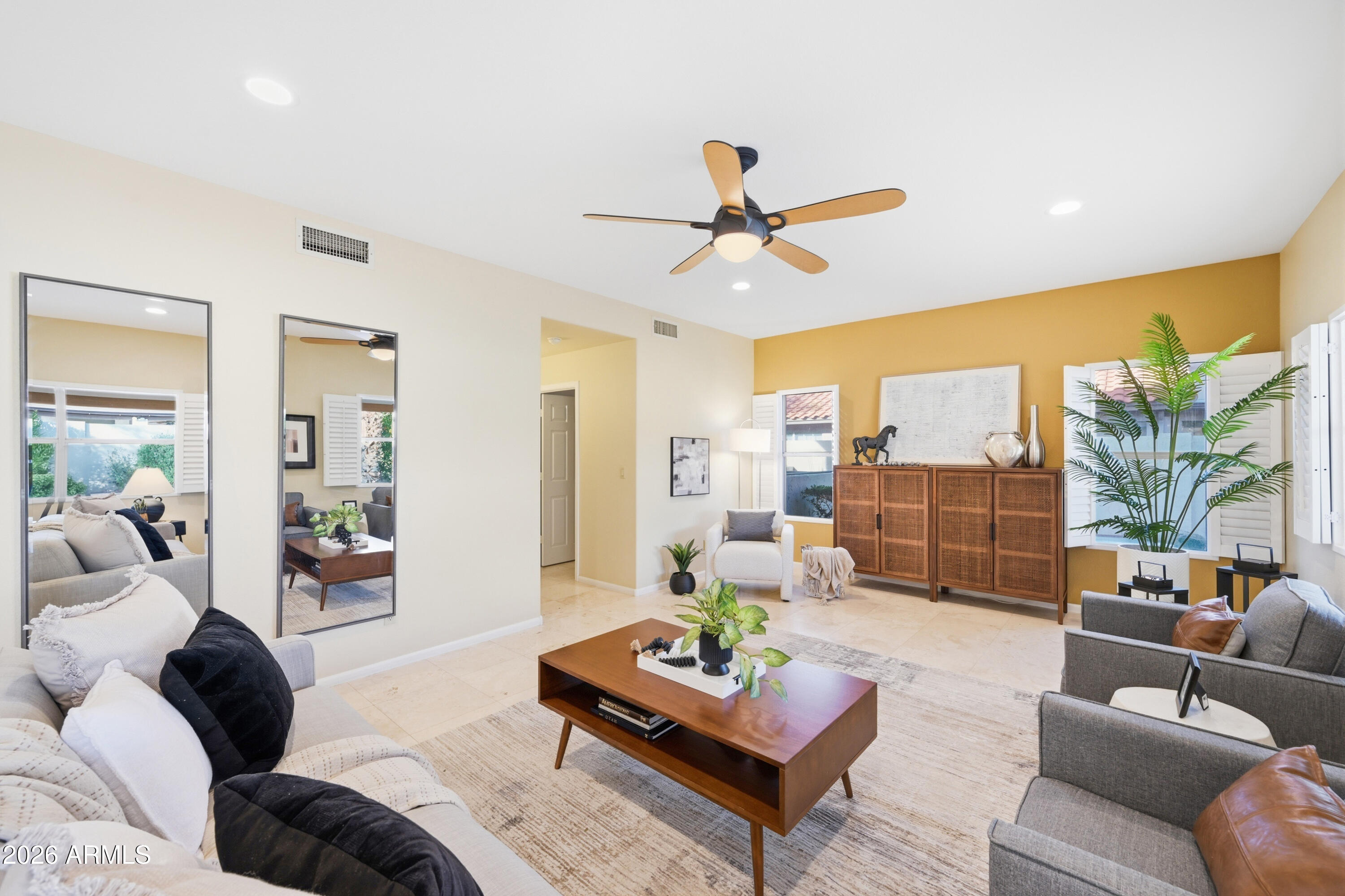 9502 East Presidio Road Scottsdale, AZ 85260 - Photo 20 of 39 a living room with furniture and a large window