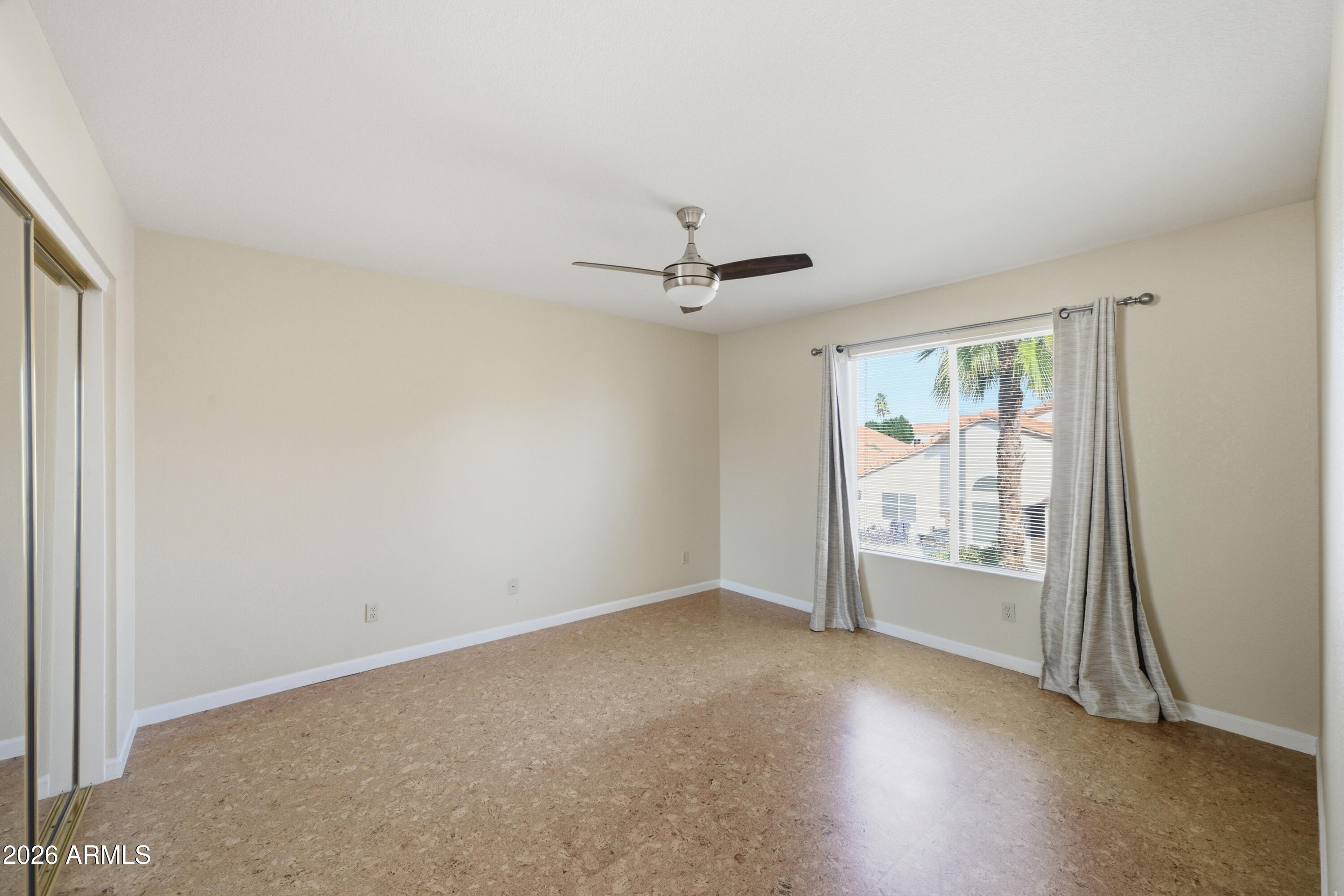 9502 East Presidio Road Scottsdale, AZ 85260 - Photo 29 of 39 an empty room with windows and closet