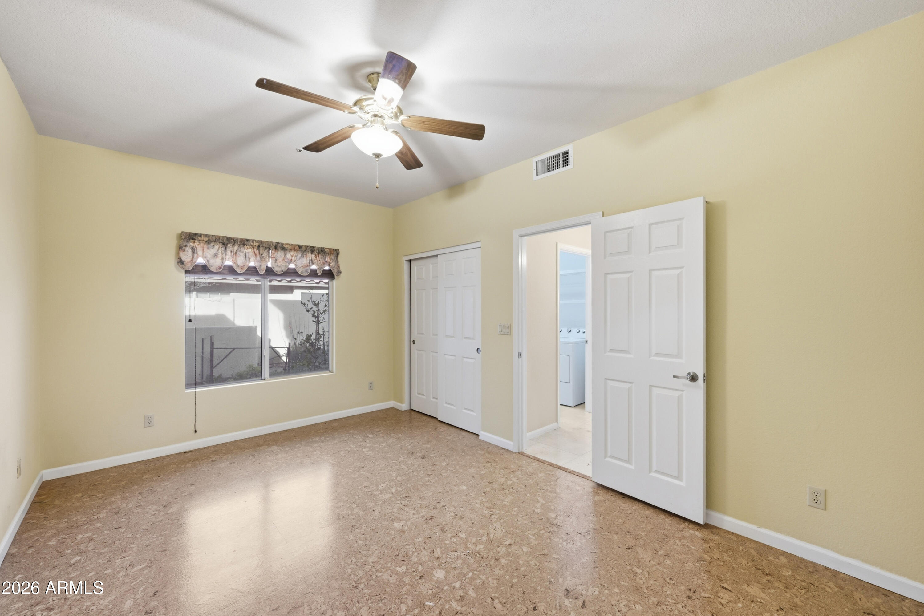 9502 East Presidio Road Scottsdale, AZ 85260 - Photo 33 of 39 a view of an empty room with a window