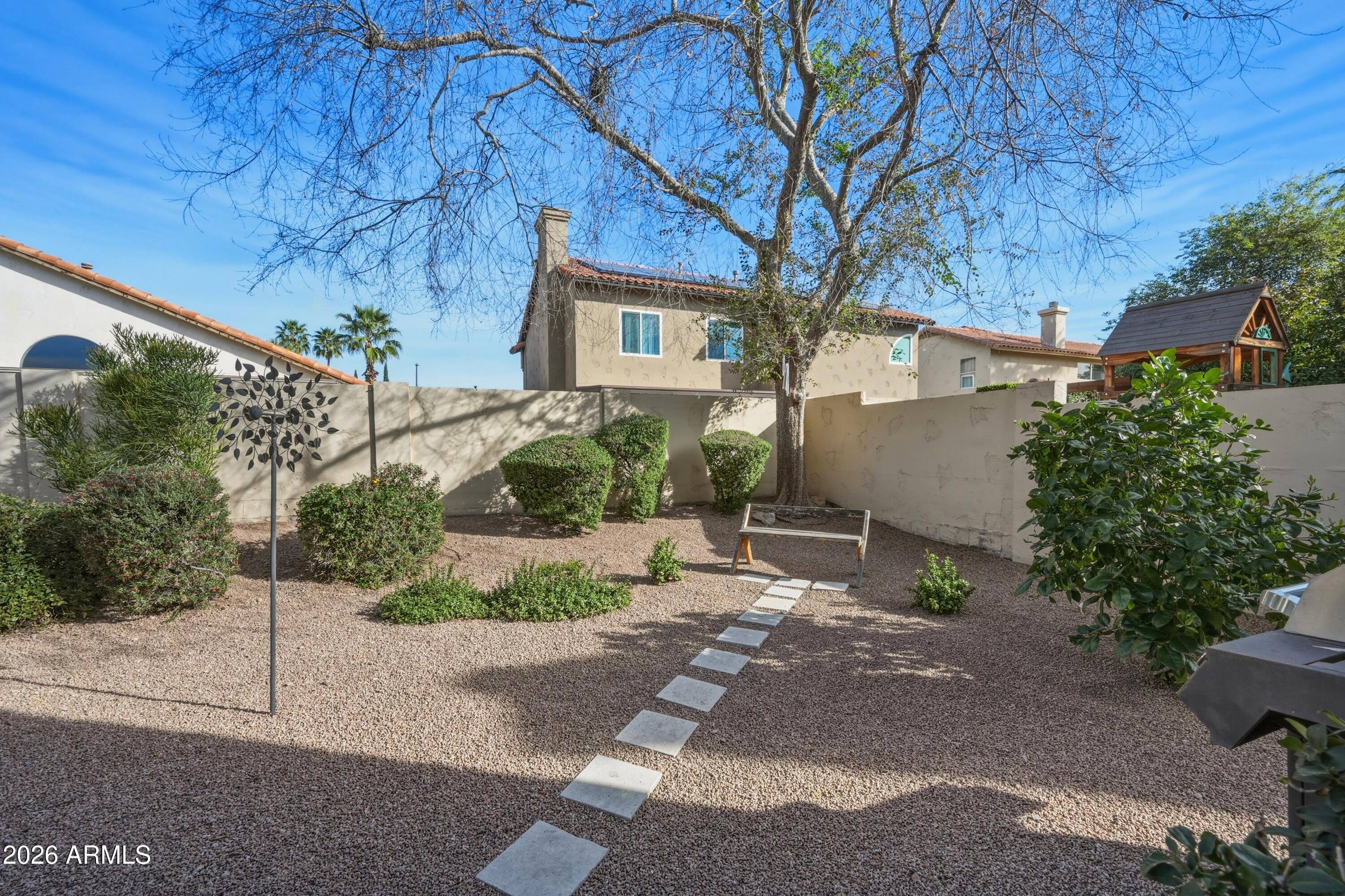 9502 East Presidio Road Scottsdale, AZ 85260 - Photo 36 of 39 a view of a house with a street
