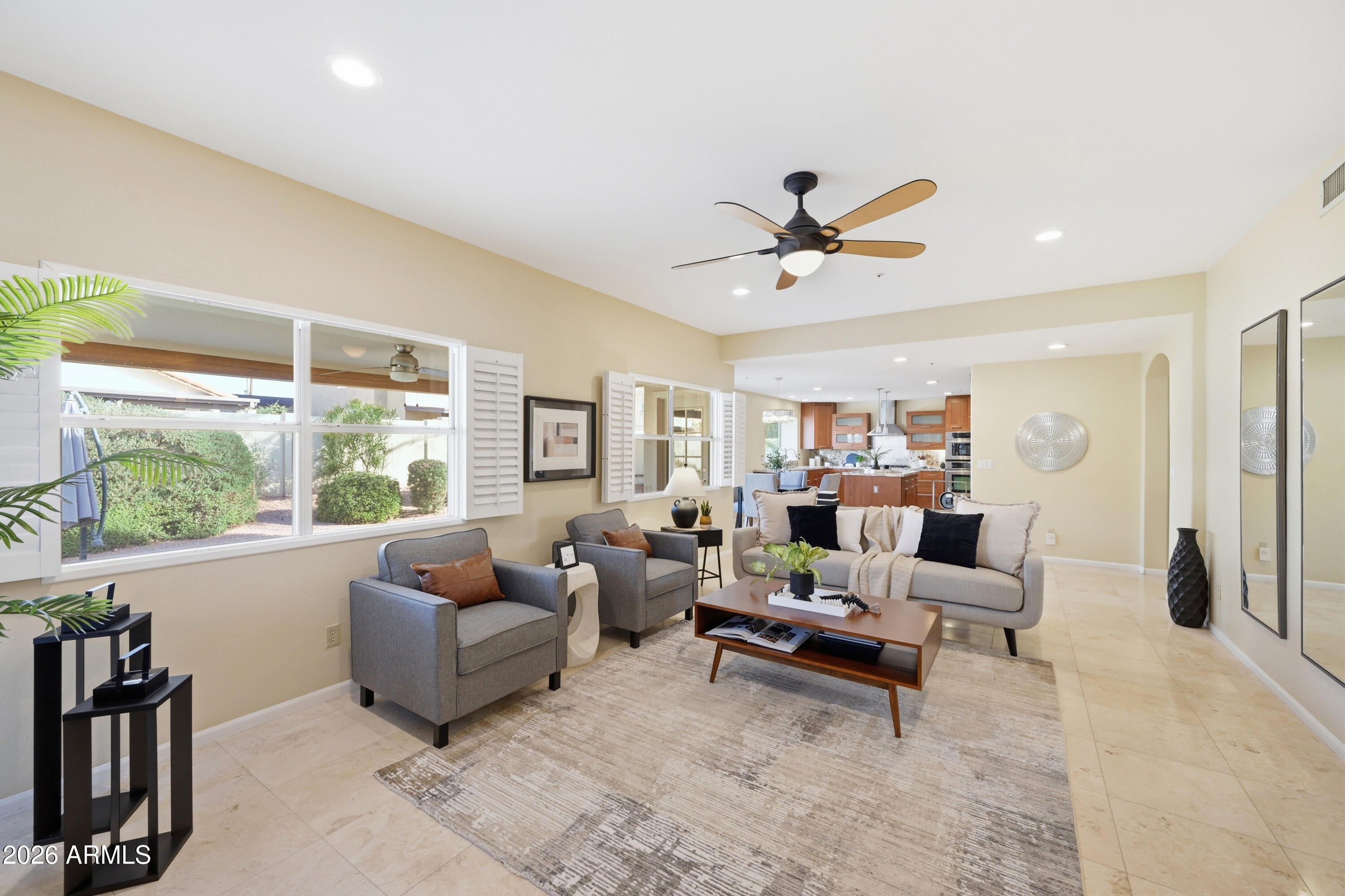 9502 East Presidio Road Scottsdale, AZ 85260 - Photo 4 of 39 a living room with furniture and a large window