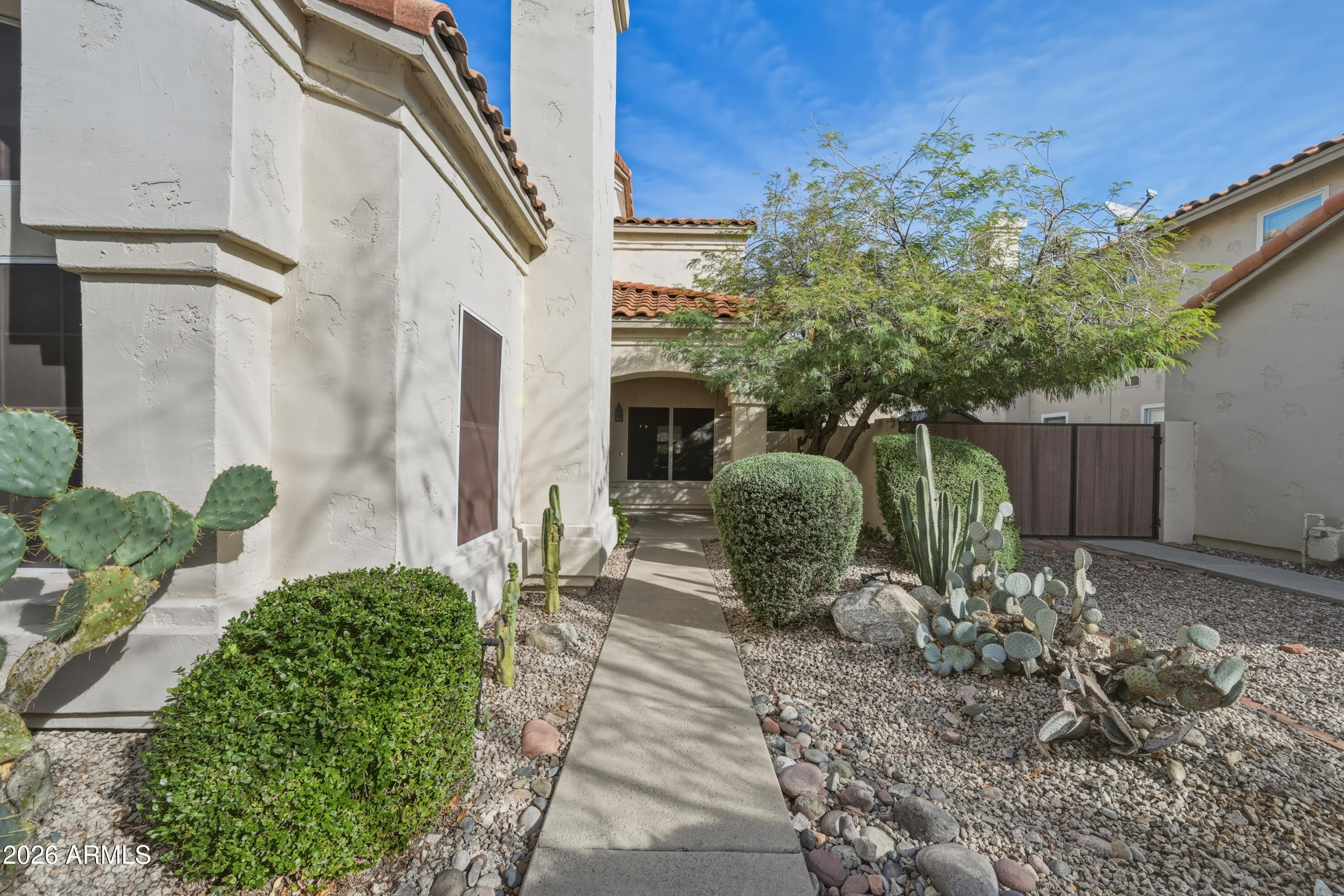 9502 East Presidio Road Scottsdale, AZ 85260 - Photo 9 of 39 a view of a back yard of the house