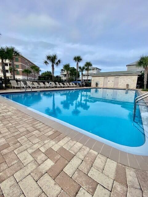 10343 East County Highway 30A, Unit B193 Inlet Beach, FL 32413 - Photo 18 of 22 a view of a swimming pool and an outdoor seating