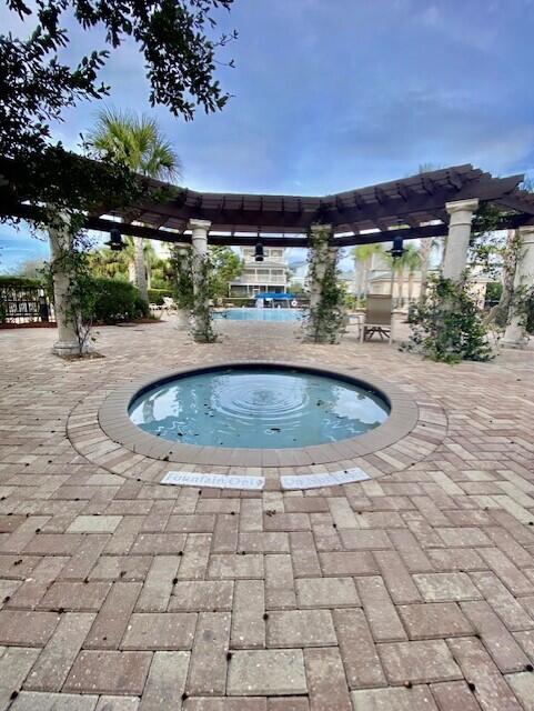 10343 East County Highway 30A, Unit B193 Inlet Beach, FL 32413 - Photo 19 of 22 a view of a swimming pool with a patio