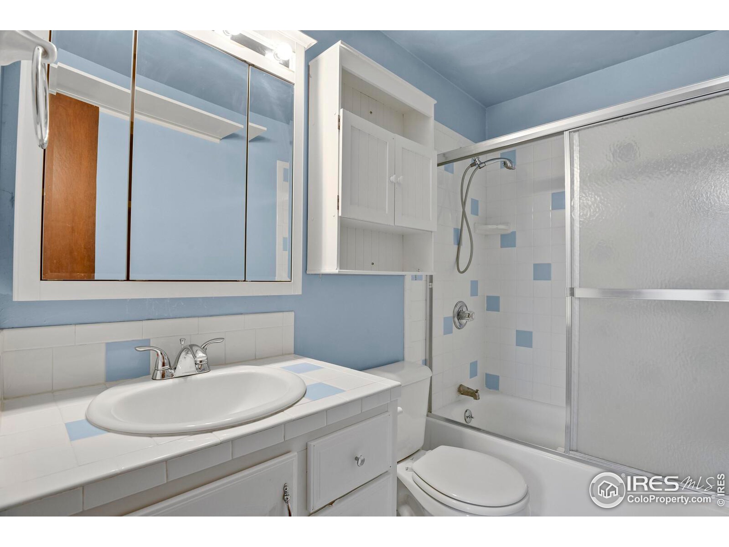 8050 Niwot Road, Unit 1 Niwot, CO 80503 - Photo 11 of 20 a bathroom with a sink toilet double vanity and shower