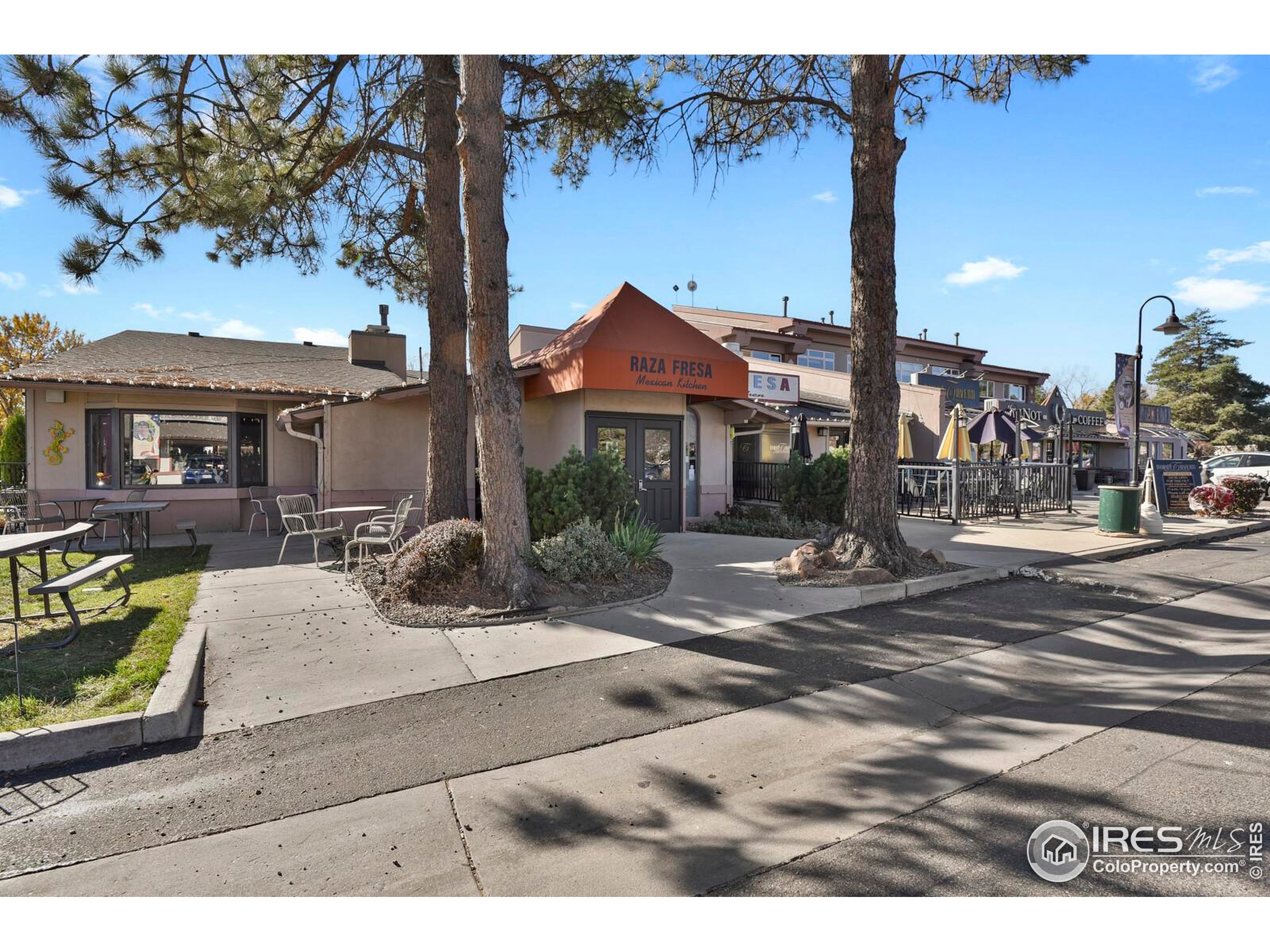 8050 Niwot Road, Unit 1 Niwot, CO 80503 - Photo 16 of 20 a view of a patio with a table and chairs