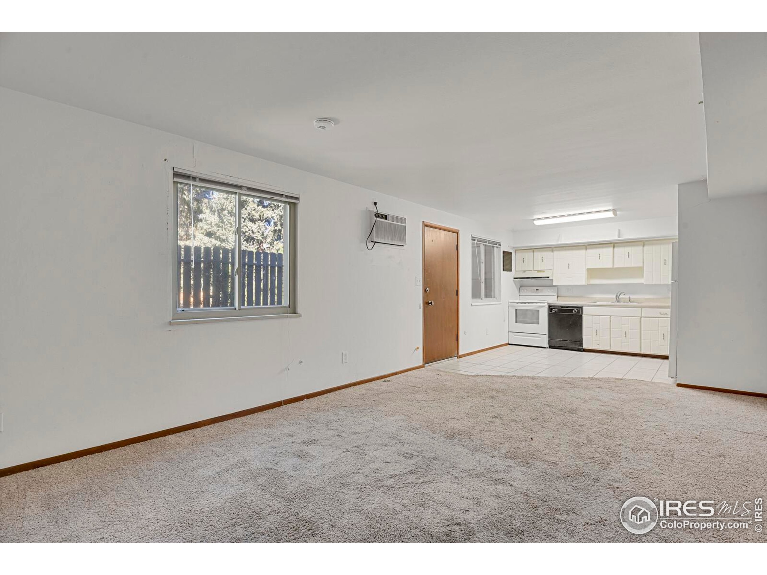 8050 Niwot Road, Unit 1 Niwot, CO 80503 - Photo 7 of 20 a big room with closet and windows
