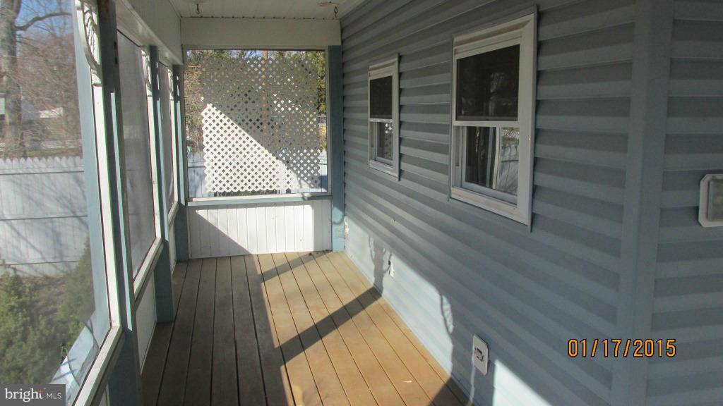 4230 Lynhurst Road Baltimore, MD 21222 - Photo 2 of 26 Enclosed front porch