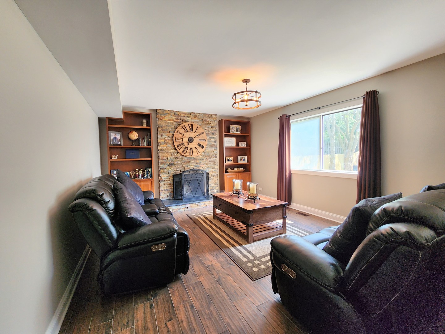 696 Dover Drive Elgin, IL 60120 - Photo 11 of 32 a living room with furniture and a wooden floor