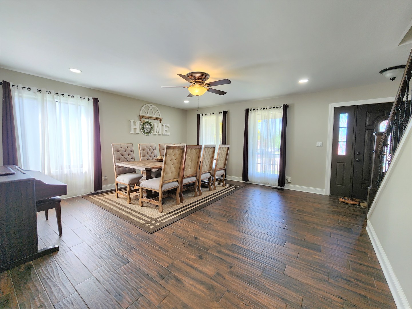 696 Dover Drive Elgin, IL 60120 - Photo 14 of 32 a living room with furniture and a wooden floor