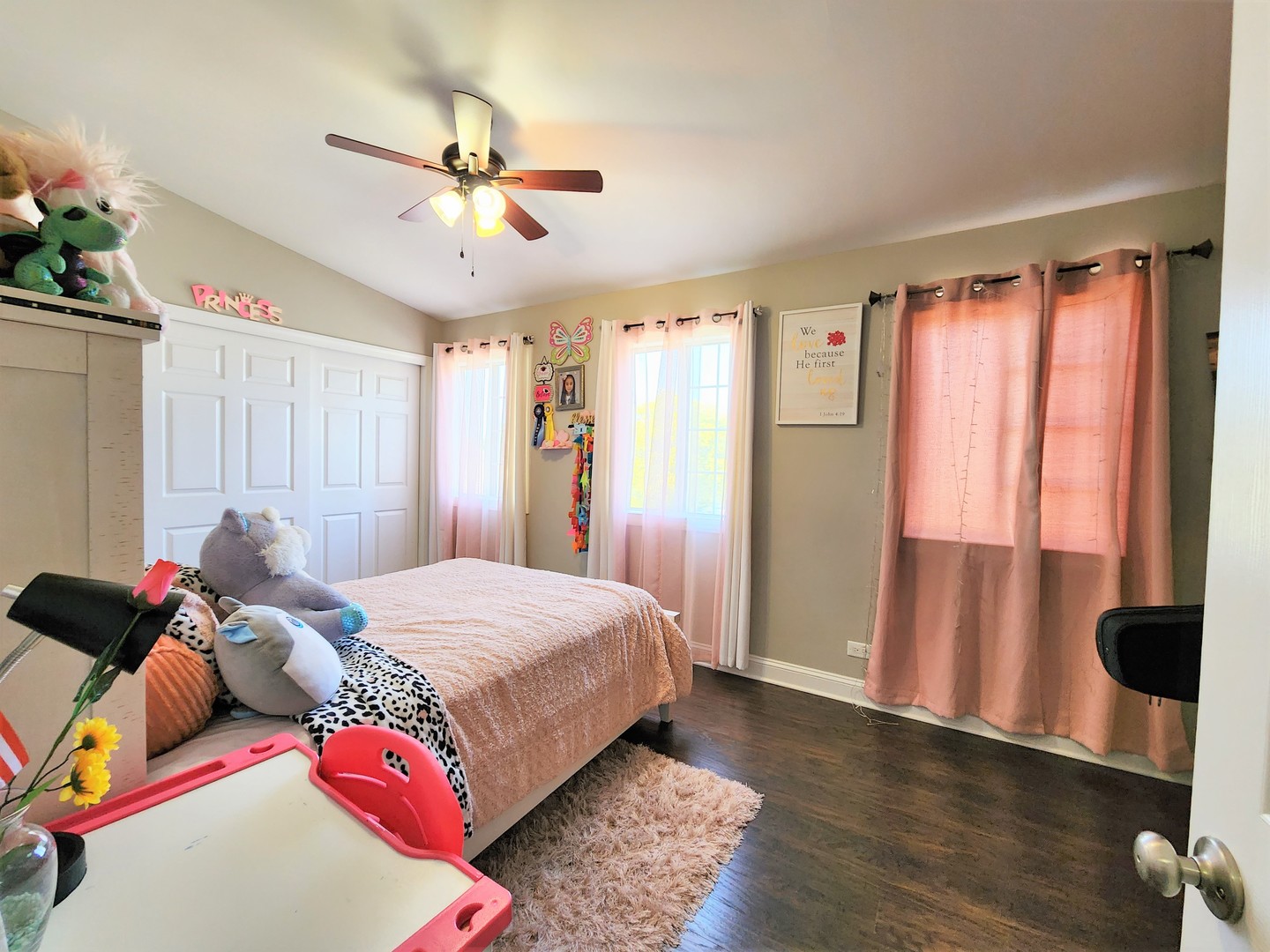696 Dover Drive Elgin, IL 60120 - Photo 18 of 32 a bedroom with a bed and a walk in closet