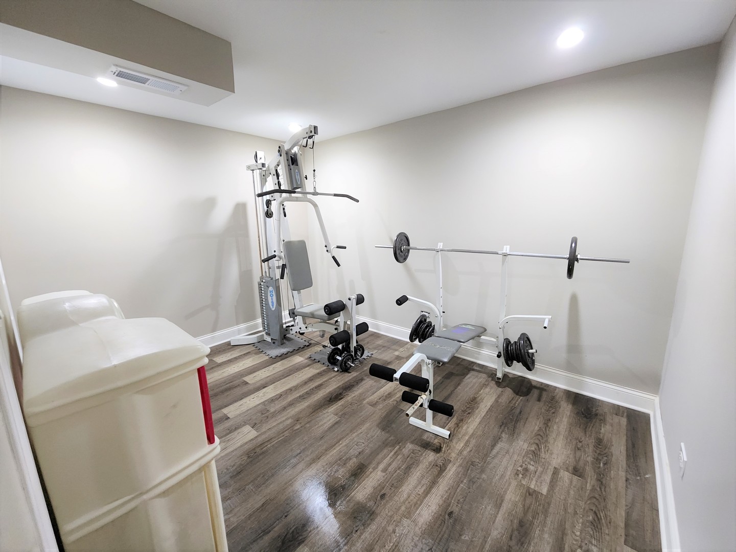 696 Dover Drive Elgin, IL 60120 - Photo 26 of 32 a room with a couch and wooden floor