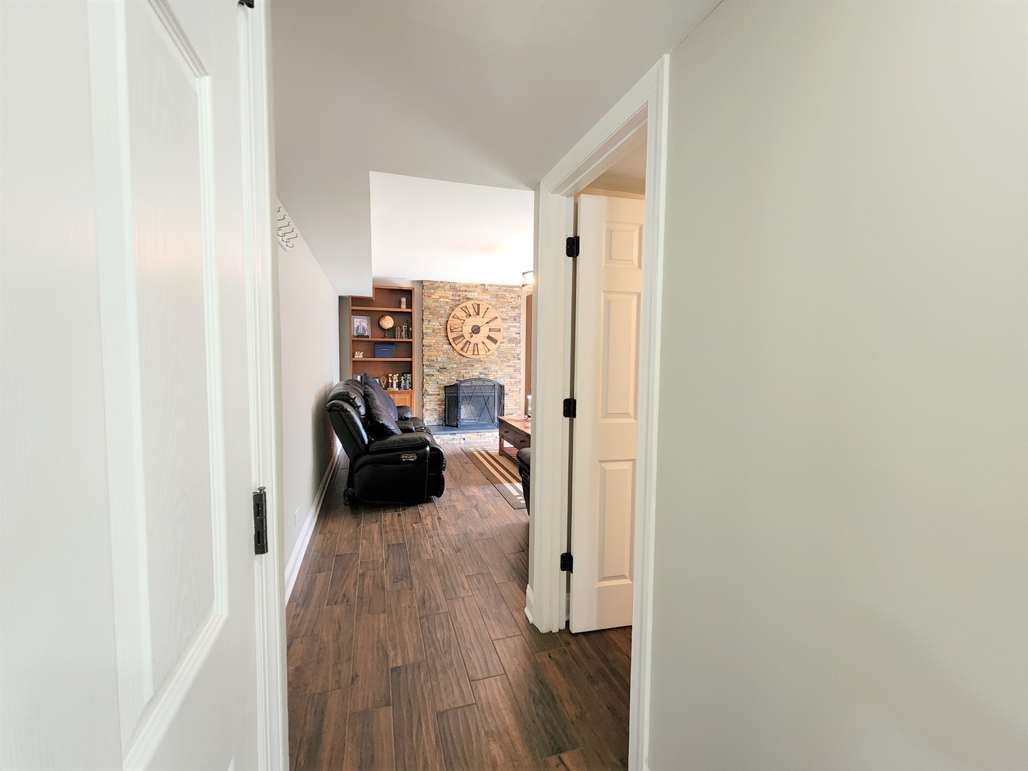 696 Dover Drive Elgin, IL 60120 - Photo 9 of 32 a view of a living room with furniture and wooden floor